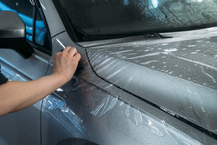 Process of Installing PPF or Paint Protection Film on car. Protective polymer skin for car